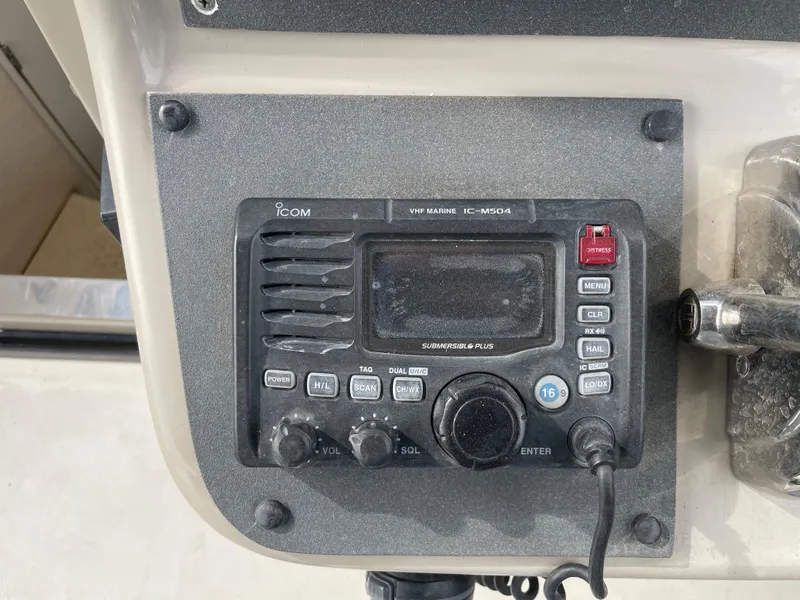 Slide: The Image of ICOM marine radio on 2006 Sea Ray 290 Amberjack boat dashboard. - 37