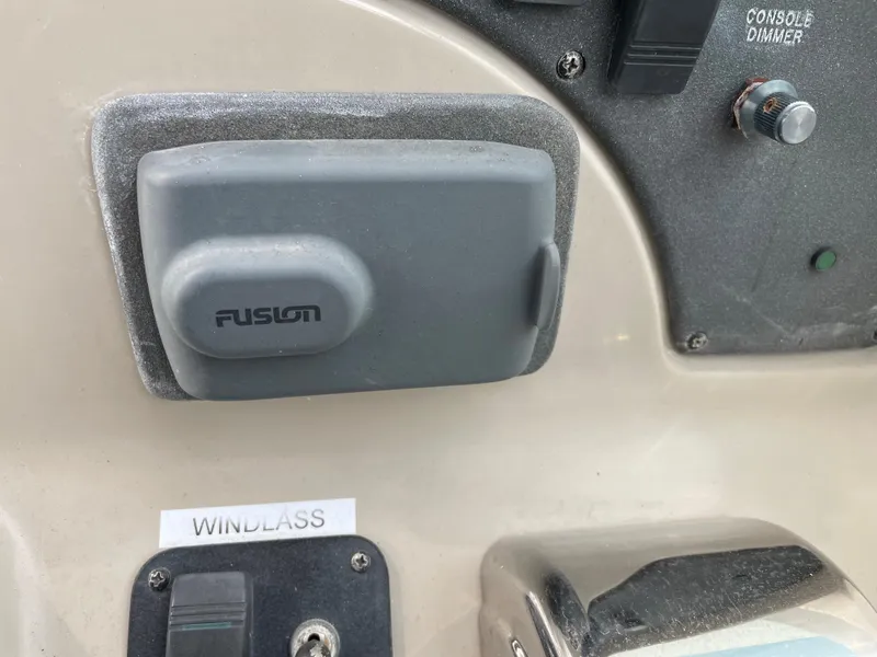 Slide: The Image of Control panel of 2006 Sea Ray 290 Amberjack with Fusion audio system. - 38