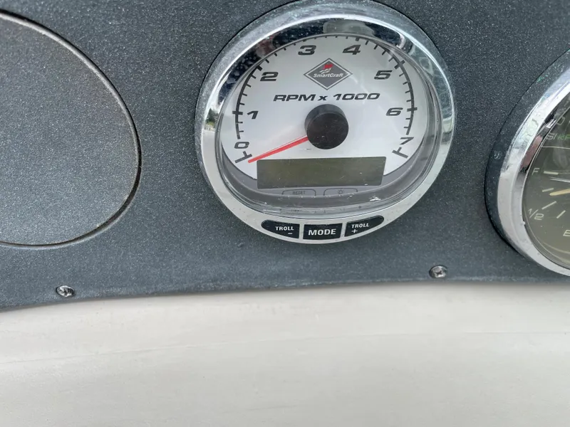 Slide: The Image of Tachometer on 2006 Sea Ray 290 Amberjack boat dashboard, showing RPM x 1000 gauge. - 40