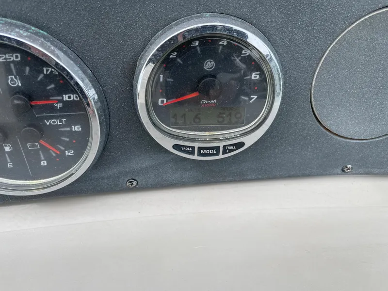 Slide: The Image of Close-up of 2006 Sea Ray 290 Amberjack dashboard gauges. - 41