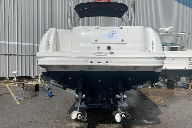 Slide: The Image of 2006 Sea Ray 290 Amberjack boat in dry dock, rear view. - 63