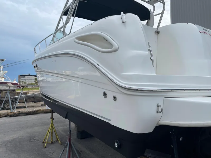 Slide: The Image of 2006 Sea Ray 290 Amberjack boat on dry dock for maintenance. - 7