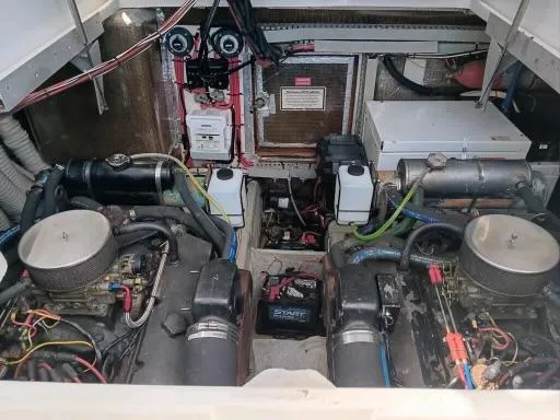 Slide: The Image of Engine compartment of a 1995 Luhrs 32 Tournament Open boat. - 14