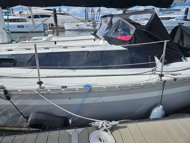 Slide: The Image of 1987 O'Day 322 sailboat docked at marina. - 5