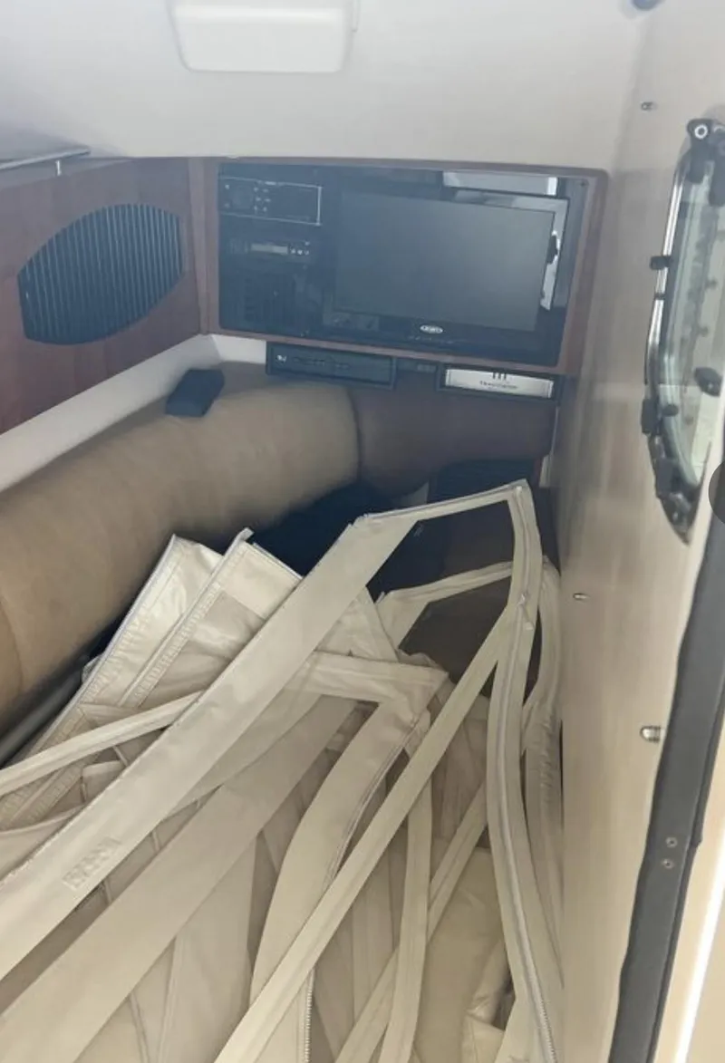 Slide: The Image of Interior cabin of 2014 Grady-White Freedom 335 boat with seating and equipment. - 5