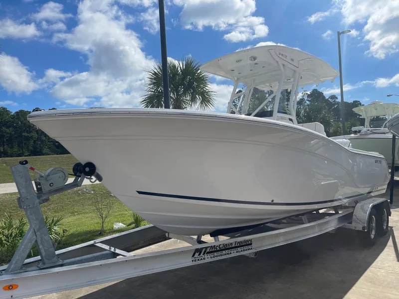 The Image of 2024 Sea Fox 248 Commander boat on trailer under blue sky. - 0