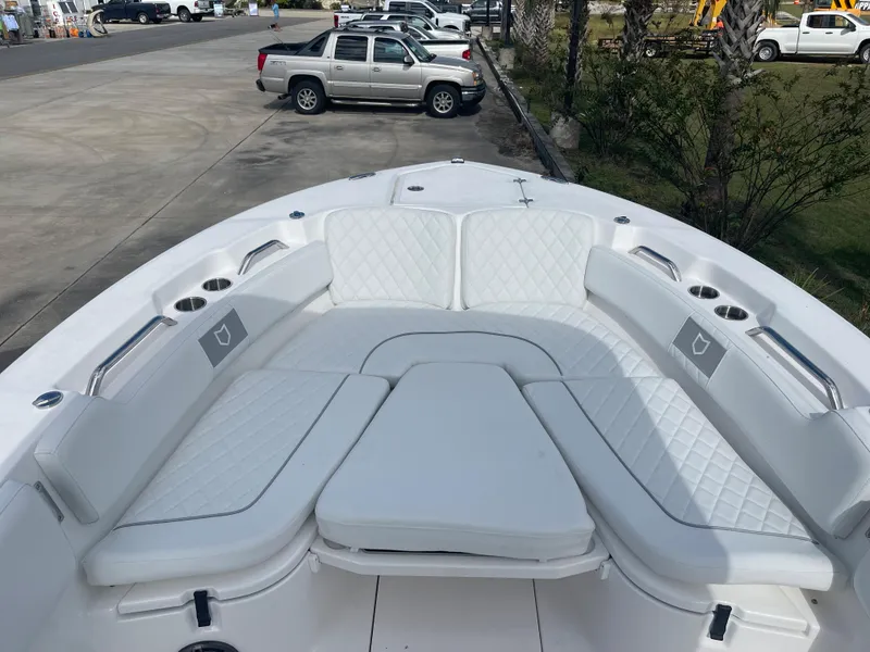Slide: The Image of 2024 Sea Fox 248 Commander boat with spacious bow seating and white upholstery. - 14
