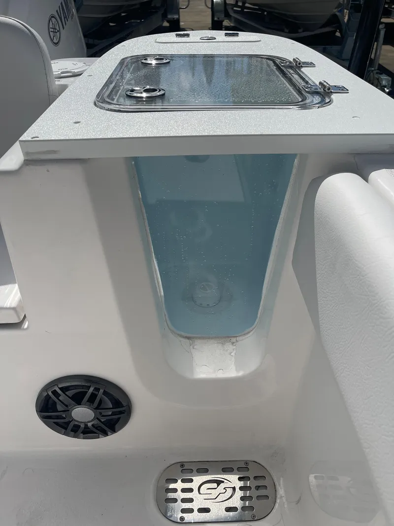 Slide: The Image of 2024 Sea Fox 248 Commander boat livewell and storage compartment. - 17