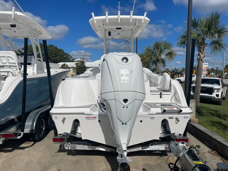 Slide: The Image of 2024 Sea Fox 248 Commander boat with 300 V6 engine, rear view. - 2