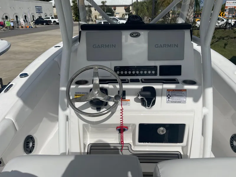 Slide: The Image of 2024 Sea Fox 248 Commander boat dashboard with Garmin navigation systems. - 3