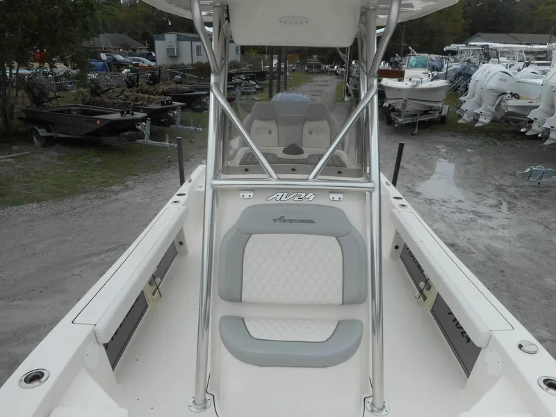 Slide: The Image of 2024 Avenger 24 Avenger boat interior with seating and console. - 5