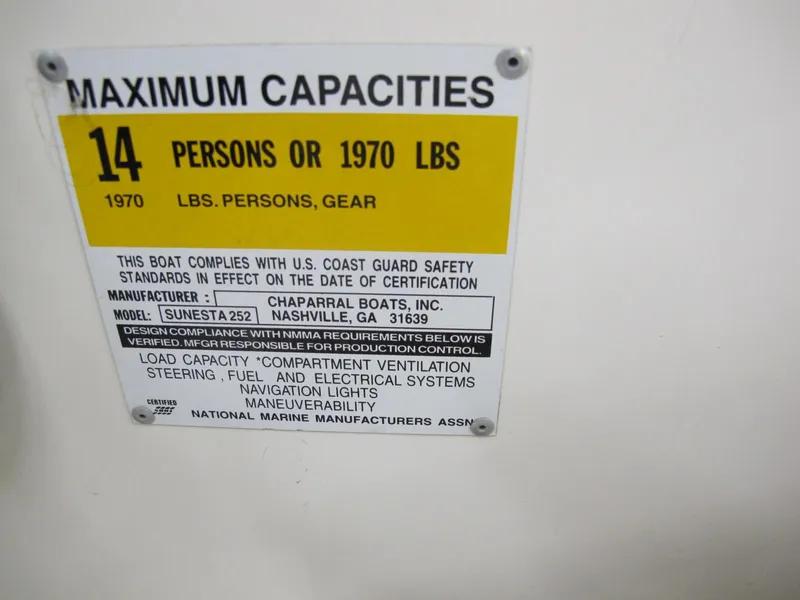 Slide: The Image of 1998 Chaparral 252 Sunesta maximum capacities label, 14 persons or 1970 lbs. - 11