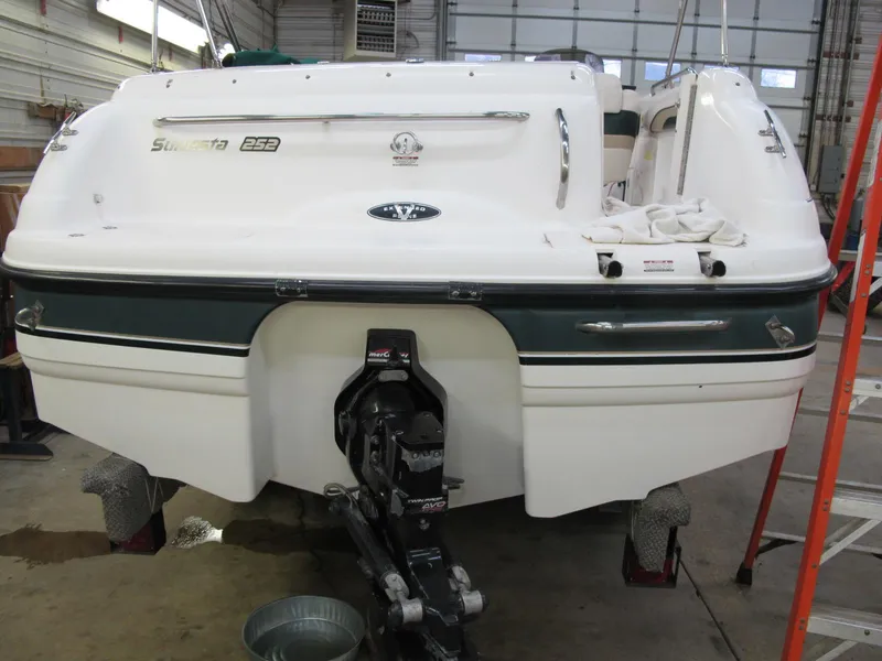 Slide: The Image of 1998 Chaparral 252 Sunesta boat in a garage, rear view. - 3
