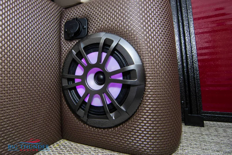 Slide: The Image of Speaker with purple LED light in 2023 Crest Classic Platinum 240 SLC boat. - 16