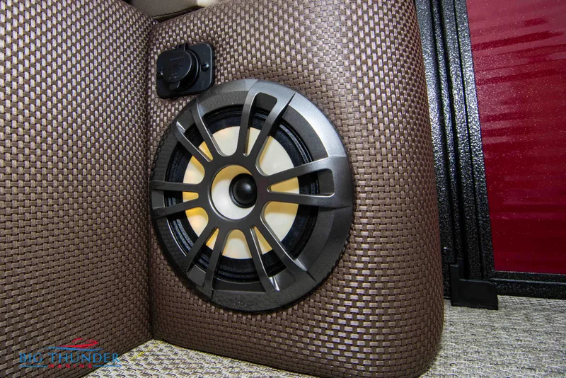 Slide: The Image of Speaker system in 2023 Crest Classic Platinum 240 SLC boat interior. - 21