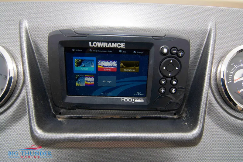 Slide: The Image of Lowrance fishfinder on 2023 Crest Classic Platinum 240 SLC boat dashboard. - 29