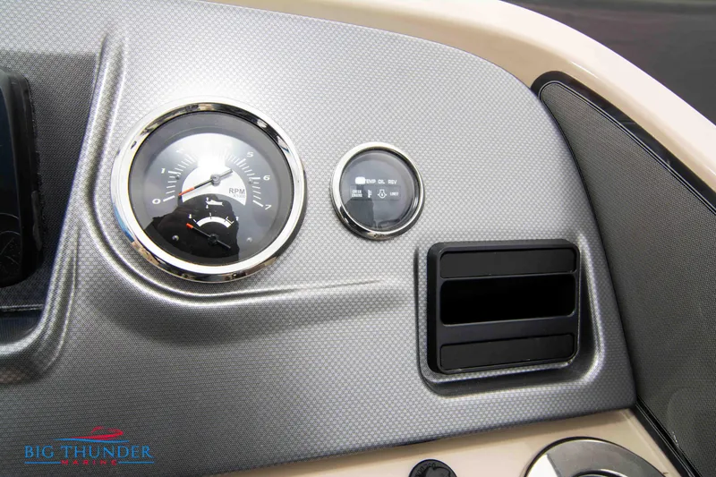 Slide: The Image of Dashboard of 2023 Crest Classic Platinum 240 SLC boat with RPM gauge. - 31
