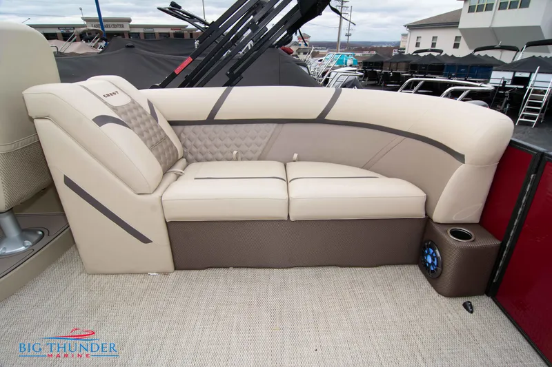 Slide: The Image of 2023 Crest Classic Platinum 240 SLC boat interior seating with beige upholstery. - 40
