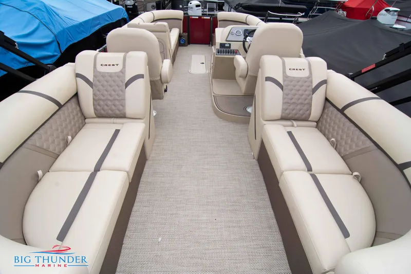 Slide: The Image of 2023 Crest Classic Platinum 240 SLC pontoon boat interior with beige seating. - 41