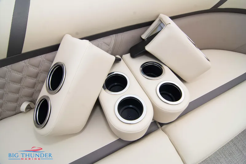 Slide: The Image of 2023 Crest Classic Platinum 240 SLC boat with beige cup holders on seats. - 47