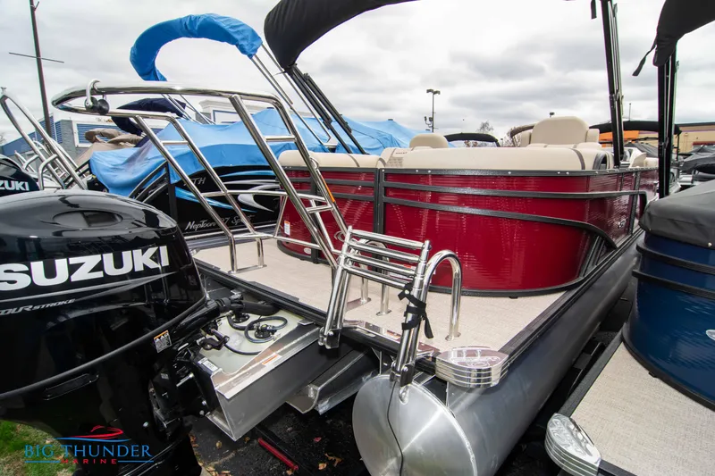 Slide: The Image of 2023 Crest Classic Platinum 240 SLC pontoon boat with Suzuki outboard motor. - 6