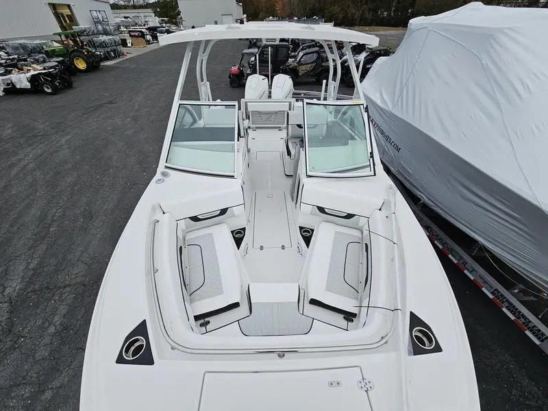 Slide: The Image of 2024 Blackfin 252 DC boat with spacious seating and modern design. - 13