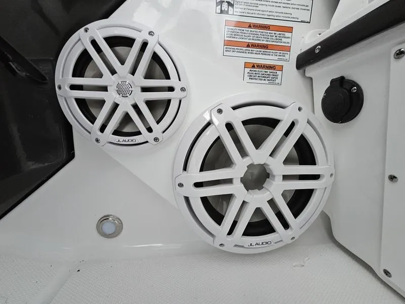 Slide: The Image of 2024 Blackfin 252 DC boat with JL Audio speakers. - 9