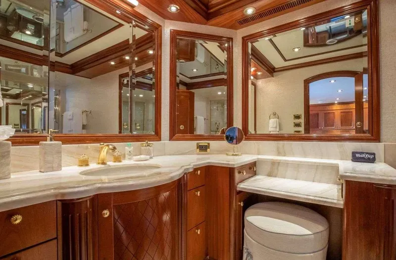 Slide: The Image of Luxurious yacht bathroom with elegant wood cabinetry and marble countertops, Richmond Yachts 2004 model. - 15