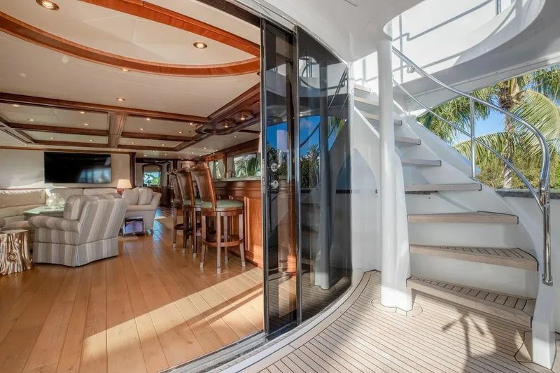Slide: The Image of Luxurious Richmond Yachts 2004 interior with elegant seating and spiral staircase. - 25