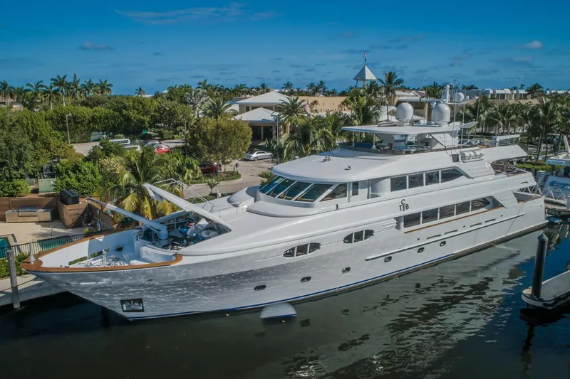 Slide: The Image of Luxurious 2004 Richmond Yachts semi-displacement yacht docked in a tropical marina. - 38