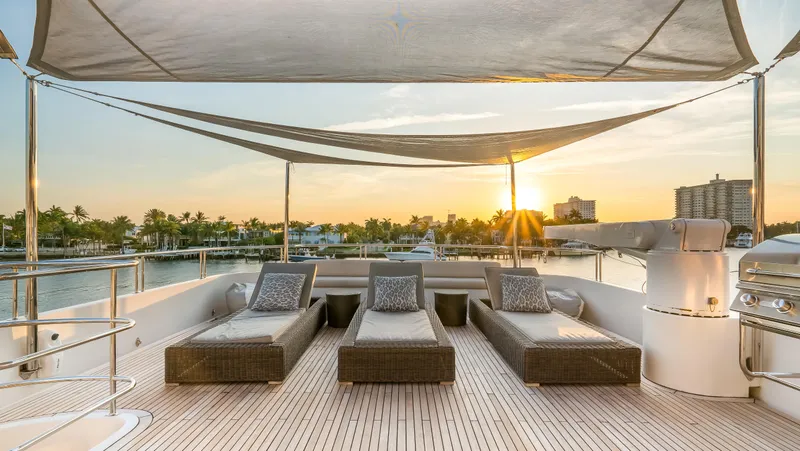 Slide: The Image of Luxurious 2004 Richmond Yachts deck with sun loungers at sunset. - 30