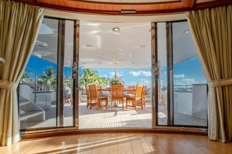 Slide: The Image of Luxurious Richmond Yachts 2004 semi-displacement model with elegant outdoor dining area and ocean view. - 22