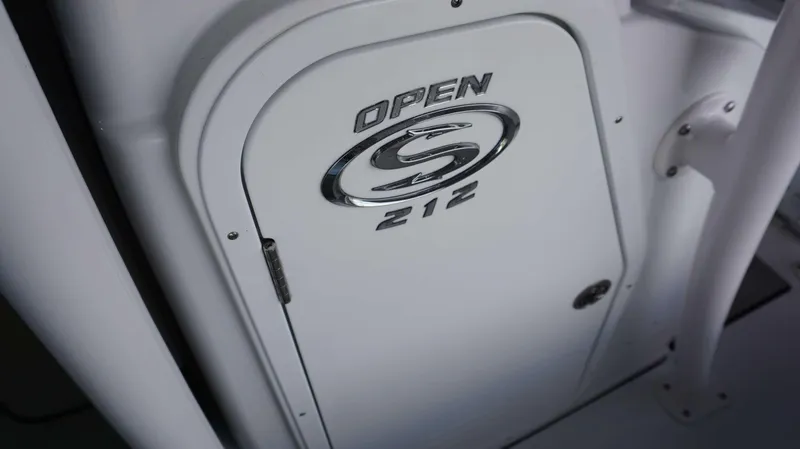 Slide: The Image of Close-up of 2024 Sportsman 212 Open boat compartment door. - 4
