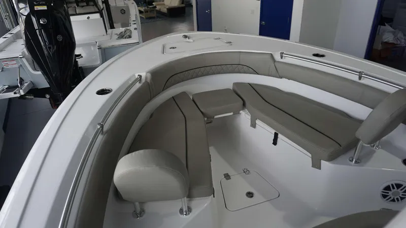 Slide: The Image of 2024 Sportsman 212 Open boat interior with cushioned seating and storage compartments. - 6