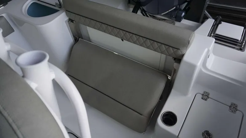 Slide: The Image of 2024 Sportsman 212 Open boat interior seating and storage area. - 7