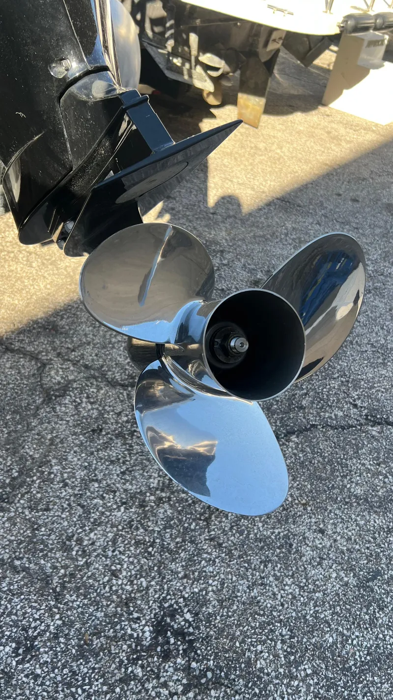 Slide: The Image of Close-up of a 2020 Crest Classic Platinum 220 SLC boat propeller. - 18