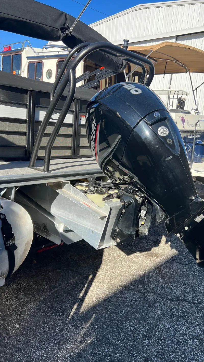 Slide: The Image of 2020 Crest Classic Platinum 220 SLC pontoon boat with Mercury outboard motor. - 3