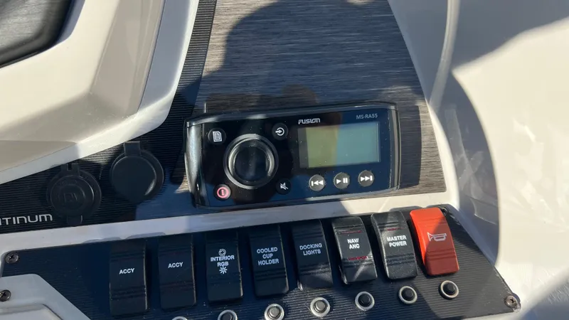Slide: The Image of Control panel of a 2020 Crest Classic Platinum 220 SLC boat with Fusion MS-RA55 stereo. - 6