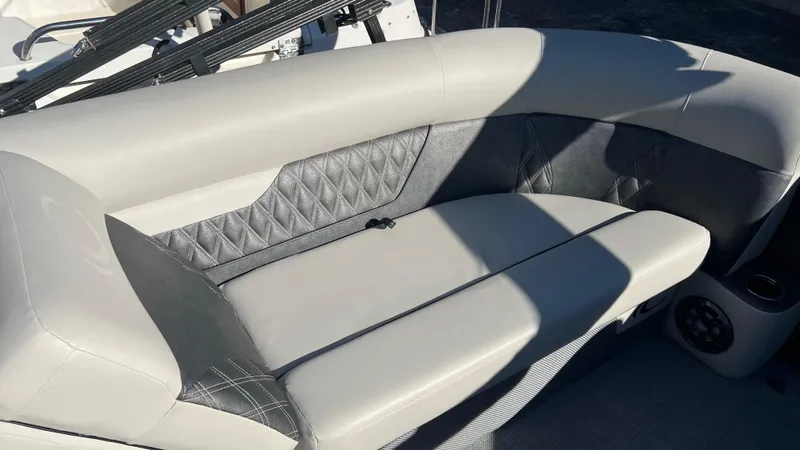 Slide: The Image of 2020 Crest Classic Platinum 220 SLC boat interior seating with diamond-stitched upholstery. - 9
