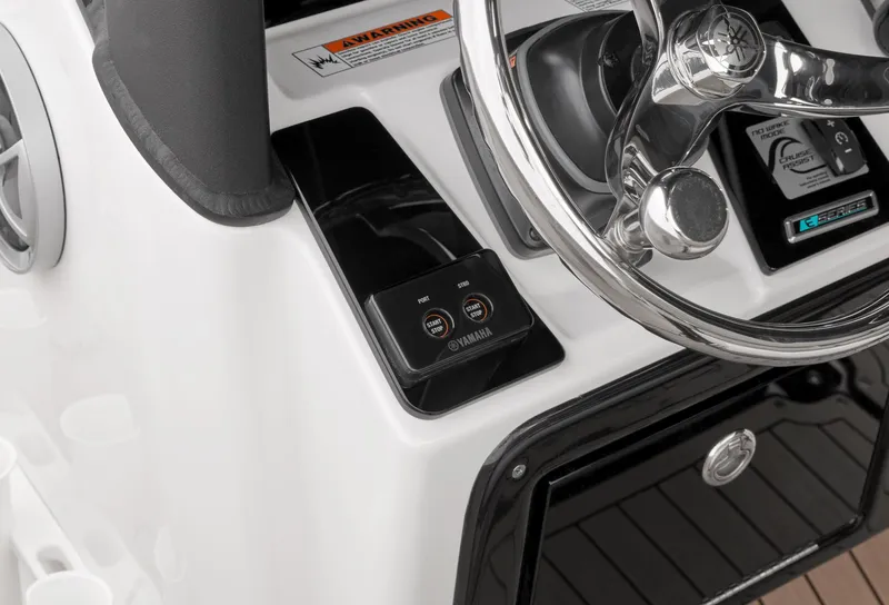 Slide: The Image of Close-up of the 2024 Yamaha Boats 255 FSH Sport H steering console. - 4