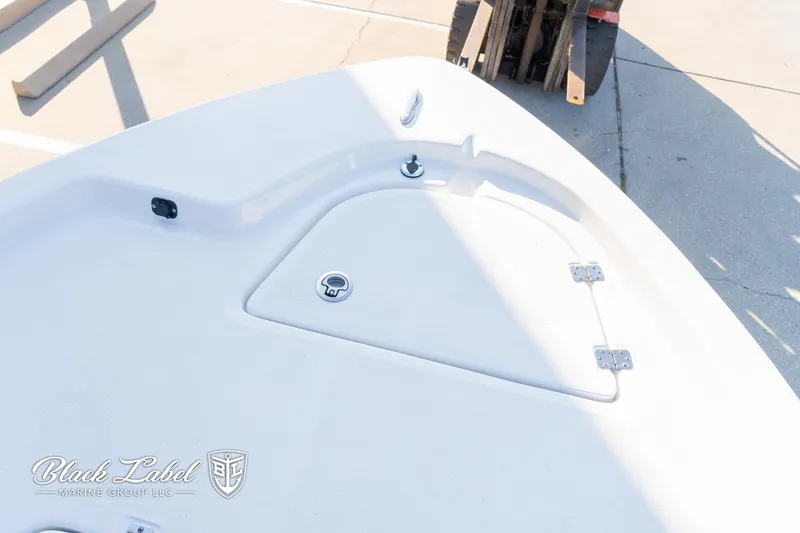 Slide: The Image of 2024 Sea Fox 251 BayFox Center Console boat deck with storage compartment. - 10