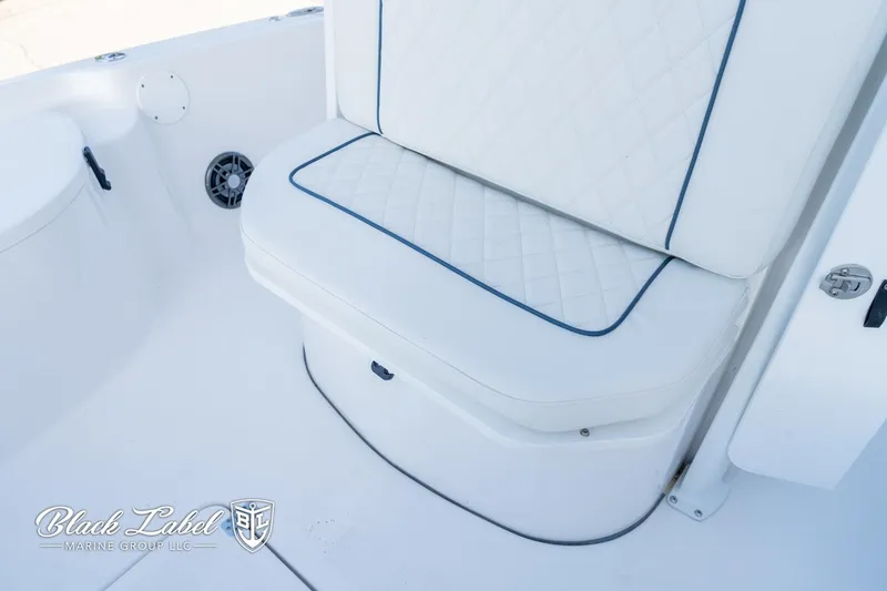 Slide: The Image of 2024 Sea Fox 251 BayFox Center Console boat seat with quilted cushion design. - 13