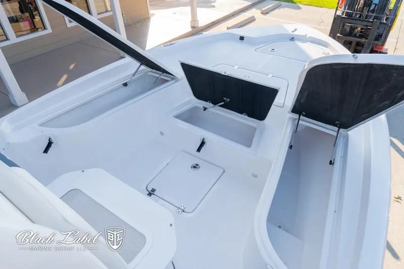 Slide: The Image of 2024 Sea Fox 251 BayFox Center Console boat with open storage compartments. - 7