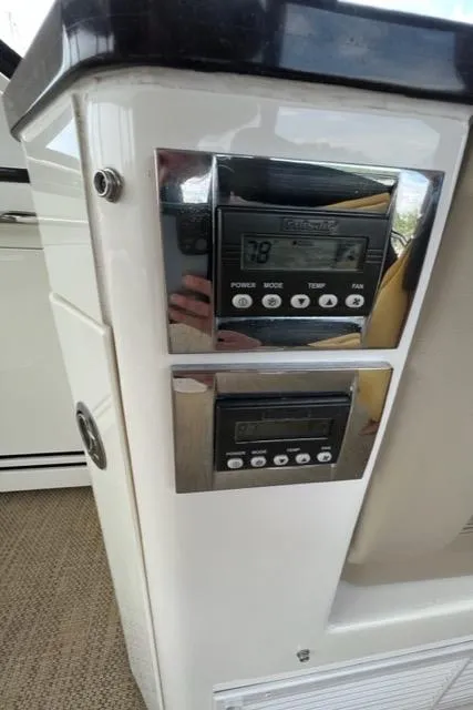 Slide: The Image of Control panel of a 2016 Sea Ray 510 Fly yacht. - 40