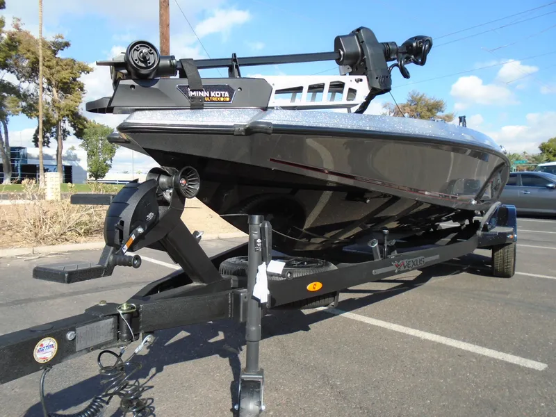 Slide: The Image of 2024 Vexus VX20 boat on trailer in parking lot. - 12