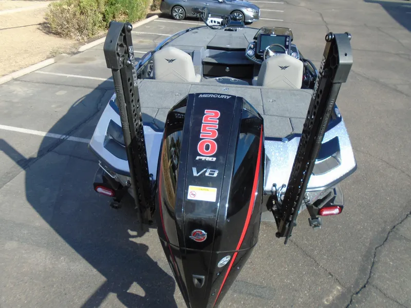 Slide: The Image of 2024 Vexus VX20 boat with Mercury 250 Pro XS V8 engine in a parking lot. - 17