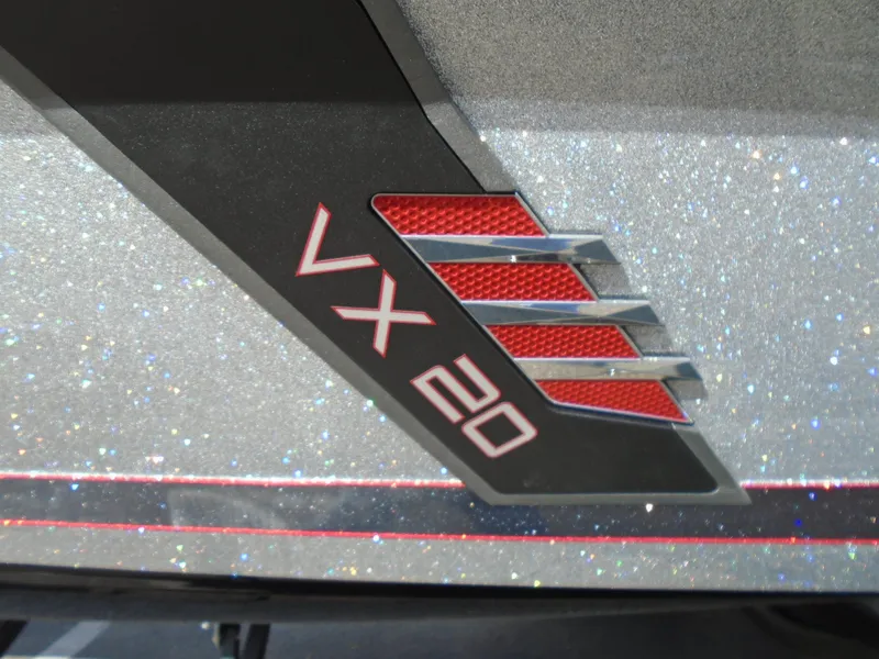 Slide: The Image of 2024 Vexus VX20 boat logo on a glittery silver surface. - 25