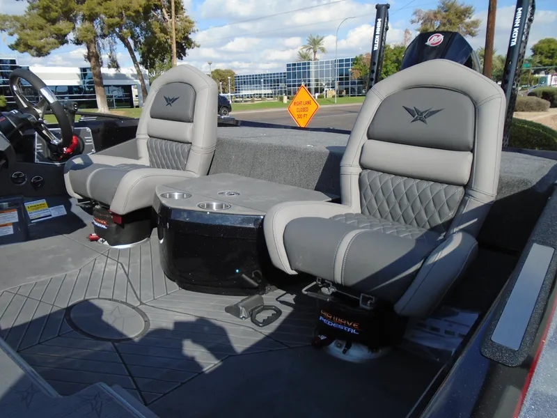Slide: The Image of 2024 Vexus VX20 boat interior with two grey seats and center console. - 27
