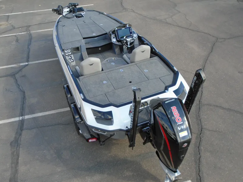 Slide: The Image of 2024 Vexus VX20 fishing boat with a powerful outboard motor. - 3