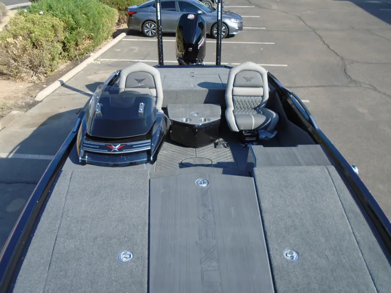 Slide: The Image of 2024 Vexus VX20 boat interior with seating and storage compartments. - 6